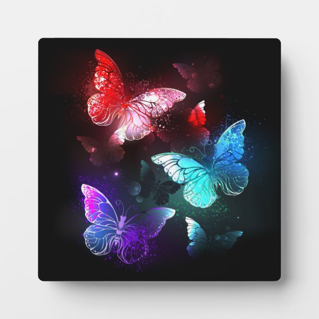 Three Glowing Butterflies on night background Plaque (Front)