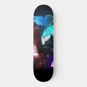 Three Glowing Butterflies on night background Skateboard