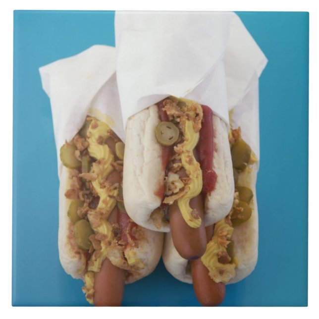 Three hot dogs in buns tile (Front)