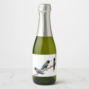 Three Hummingbirds perched on a branch of a Floss Sparkling Wine Label
