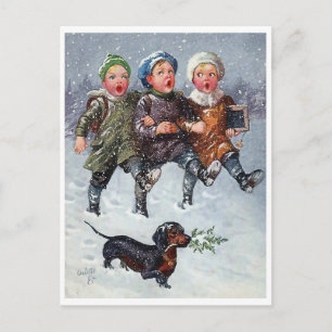 Three kid singing Christmas song on snow and dog Postcard