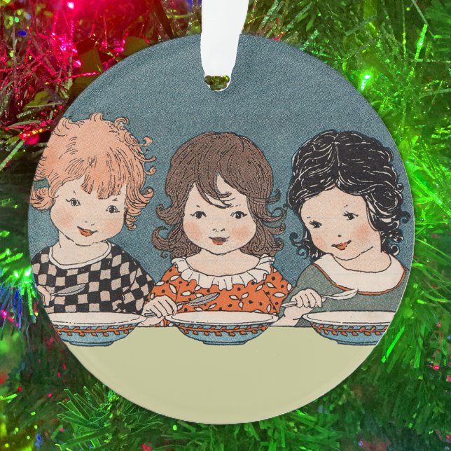 Three Little Girl Sisters at Table Eating Soup Ornament (three little girls, blond, brown, black hair at table eating soup on acrylic Christmas ornaments.)
