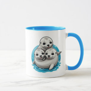 Three lovely baby seals with big eyes. mug
