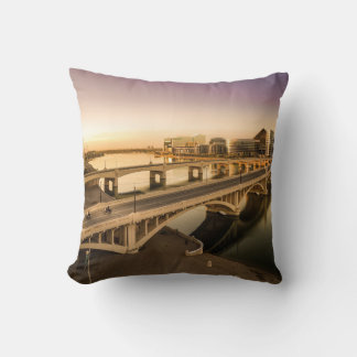 THREE MEN ON MOTORCYCLES CROSSING BRIDGE CUSHION