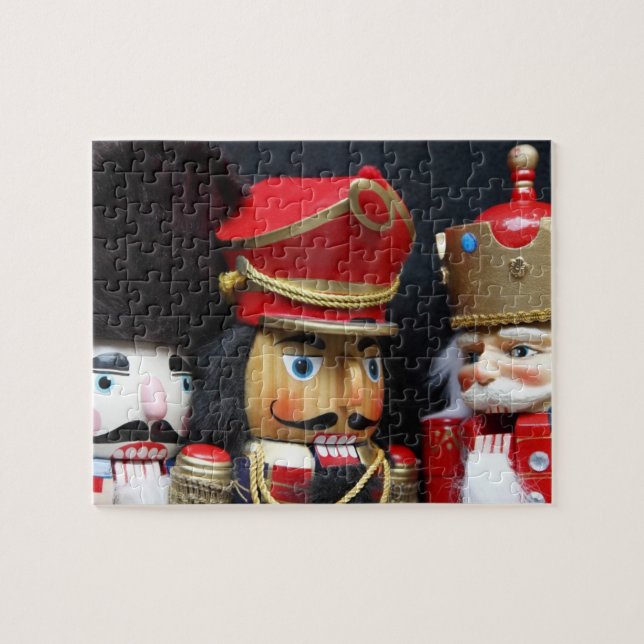 Three nutcrackers on dark background jigsaw puzzle (Horizontal)