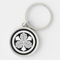 Three oak leaves with swords in circle
