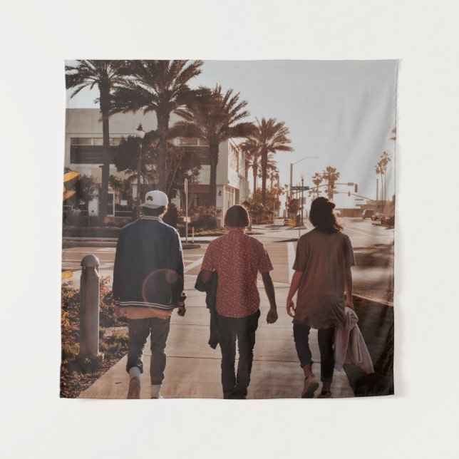 Three persons walking near palm trees tapestry (Front)