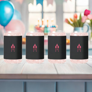 Three pink flowers with a black background can glass