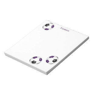 three purple black soccer balls  notepad
