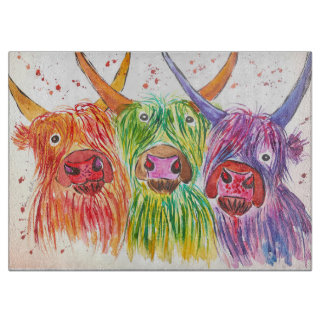 Three quirky colourful highland cows cutting board