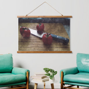 Three red tomatoes on a chopping board   hanging tapestry