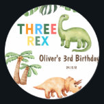 Three Rex kids birthday party Classic Round Sticker<br><div class="desc">Three Rex kids birthday party Classic Round Sticker is a cute design with green colours and dinosaurs and tropical leaves. Customise or edit further by please clicking the "customise further" link and use our design tool to modify this template. All text style, colours, sizes can be modified to fit your...</div>