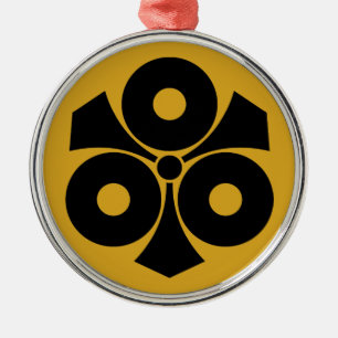 Three snake eyes with swords metal tree decoration