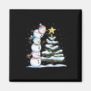 Three Snowmen Are Arranging A Christmas Tree Cute Magnet