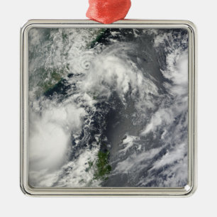 Three strong storms metal ornament