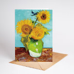 Three Sunflowers | Vincent van Gogh Card<br><div class="desc">Three Sunflowers (1888) by Vincent van Gogh is a vibrant still life that showcases the artist’s signature thick brushstrokes and bold use of colour. The painting features three sunflowers in a simple vase, their golden petals contrasting against the aqua blue background. Van Gogh's vivid yellow palette brings energy and life...</div>