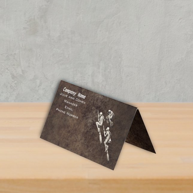 Three White Flying Witches Brooms Mottled Browns Business Card (Three pretty white witches flying on brooms on mottled shades of brown standing business card.)