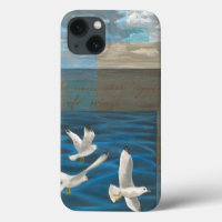 Three White Seagulls Flying Over the Water