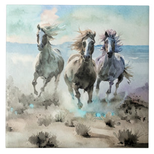 Three Wild Horses Race Across a Dusty Prairie Ceramic Tile