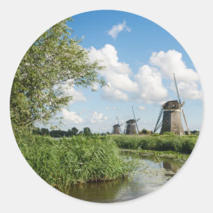 Three windmills and a canal round sticker