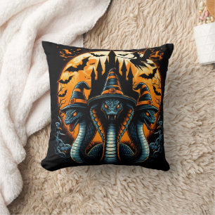 Three witch-hat snakes under a full moon cushion
