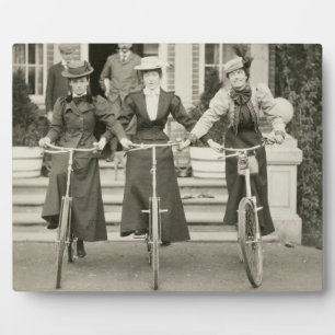 Three women on bicycles, early 1900s (b/w photo) plaque