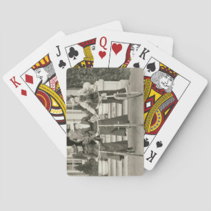 Three women on bicycles, early 1900s (b/w photo) playing cards