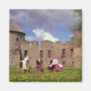 Three young women in traditional clothes magnet