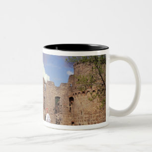 Three young women in traditional clothes Two-Tone coffee mug