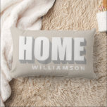 Throw Pillow<br><div class="desc">Personalized modern minimalist lumbar pillow with the family name for example and bold Home quote typography, with cool shadow relief effect. Neutral warm beige background, white and gray for the sans serif text, easy to match in any ambient. Premium look, scandinavian simple chic for your home decor or as a...</div>