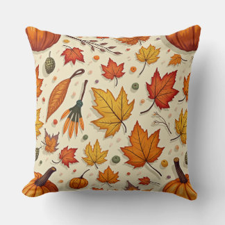 Throwing pillows with autumn leaves and pumpkins