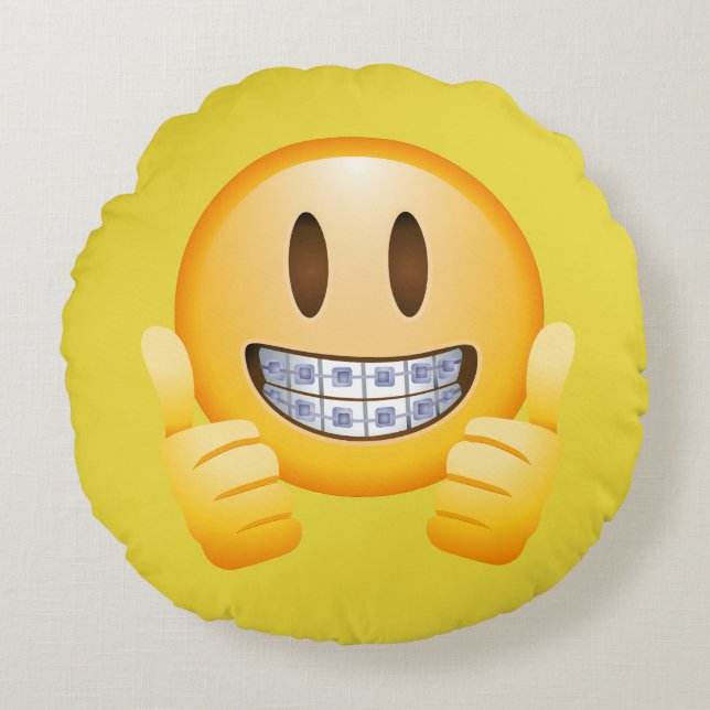 thumbs braces emoji  girl with braces round cushion (Front)