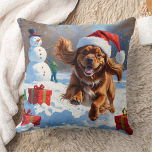 Tibetan Spaniel Running in Snow with Christmas Hat Cushion