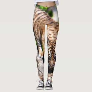 Tiger cub climbing down tree leggings