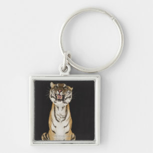 Tiger sitting on platform key ring