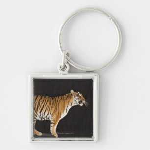 Tiger standing on platform key ring