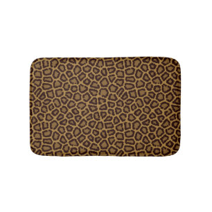 Tile background with a leopard fur bath mat