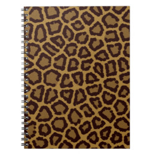 Tile background with a leopard fur notebook