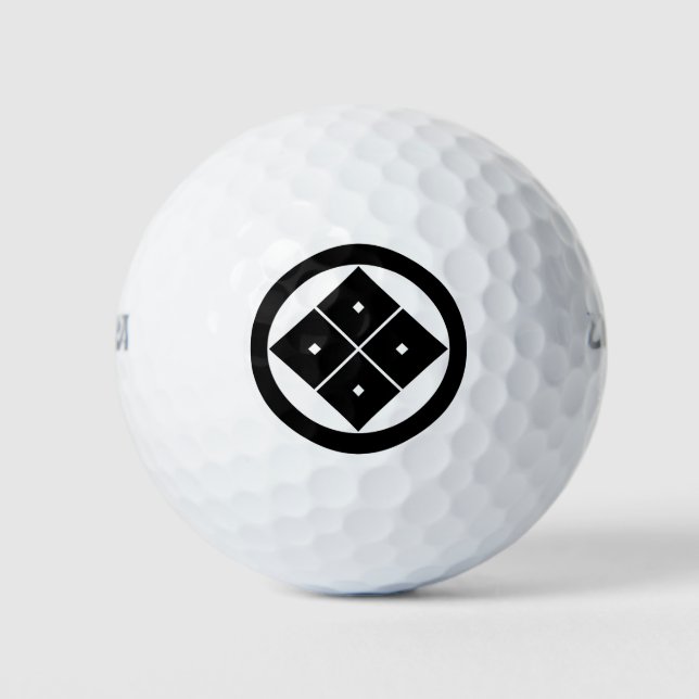 Tilted four-square-eyes in a circle golf balls (Front)