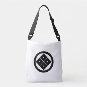 Tilted four-square-eyes in circle crossbody bag
