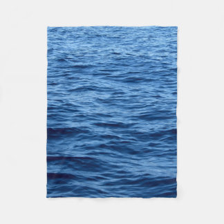 Time lapse photography of body of water fleece blanket