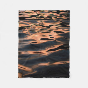 Time lapse photography of rippling water fleece blanket