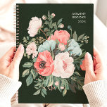 Timeless Dark Floral Custom Name Planner<br><div class="desc">This elegant design features a lush bouquet of florals in coral, blush, cream, and soft green tones, set against a rich dark green background. The personalised name and year add a refined and classic touch, perfect for professionals, students, or anyone who appreciates timeless floral artistry. Ideal for organising daily tasks,...</div>