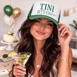 TINI Bit Older Funny Martini Birthday Trucker Hat<br><div class="desc">Celebrate in style with this playful “TINI Bit Older” trucker hat. Featuring bold green lettering and a martini glass detail, this hat is perfect for birthdays, girls’ trips, bachelorette weekends, and cocktail-themed parties. The fresh green and white colour combo gives it a fun, retro vibe while keeping it clean and...</div>