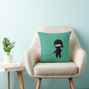 Tiny Angry Ninja on Dark Green Cushion