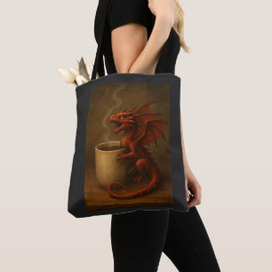 Tiny coffee dragon hugging a mug fun fantasy art tote bag