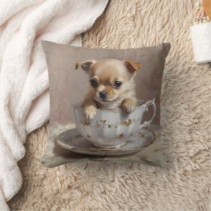 Tiny Delight: Chihuahua Puppy in a Teacup Cushion