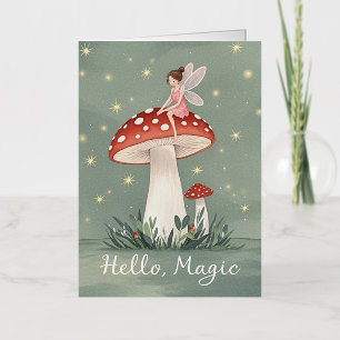 Tiny fairy perched on top of mushroom and glowing  foil greeting card