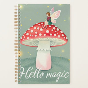 Tiny fairy perched on top of mushroom and glowing  planner