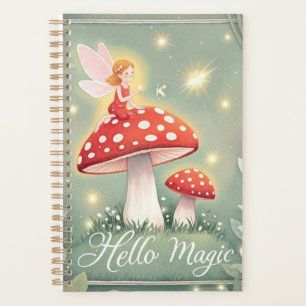 Tiny fairy perched on top of mushroom and glowing  planner